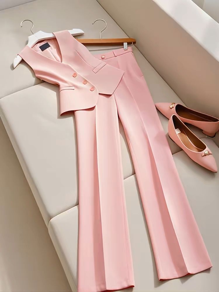 sleeveless blazer and high-waisted trousers set